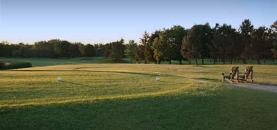 springcreek golf club - first hole and clubhouse