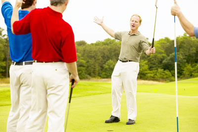 men golfing