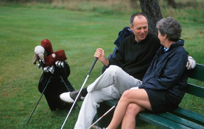 men golfing